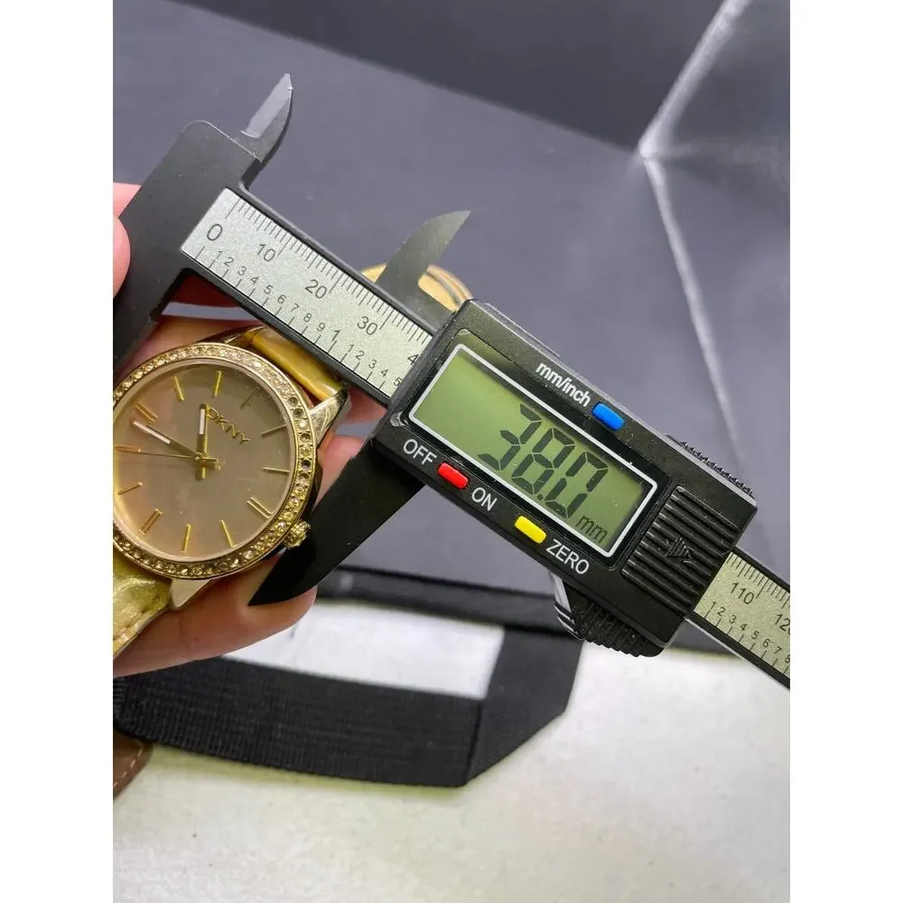 DKNY NY-4759 Mother of Pearl Dial Crystal Bezel Gold Tone Watch Leather Band